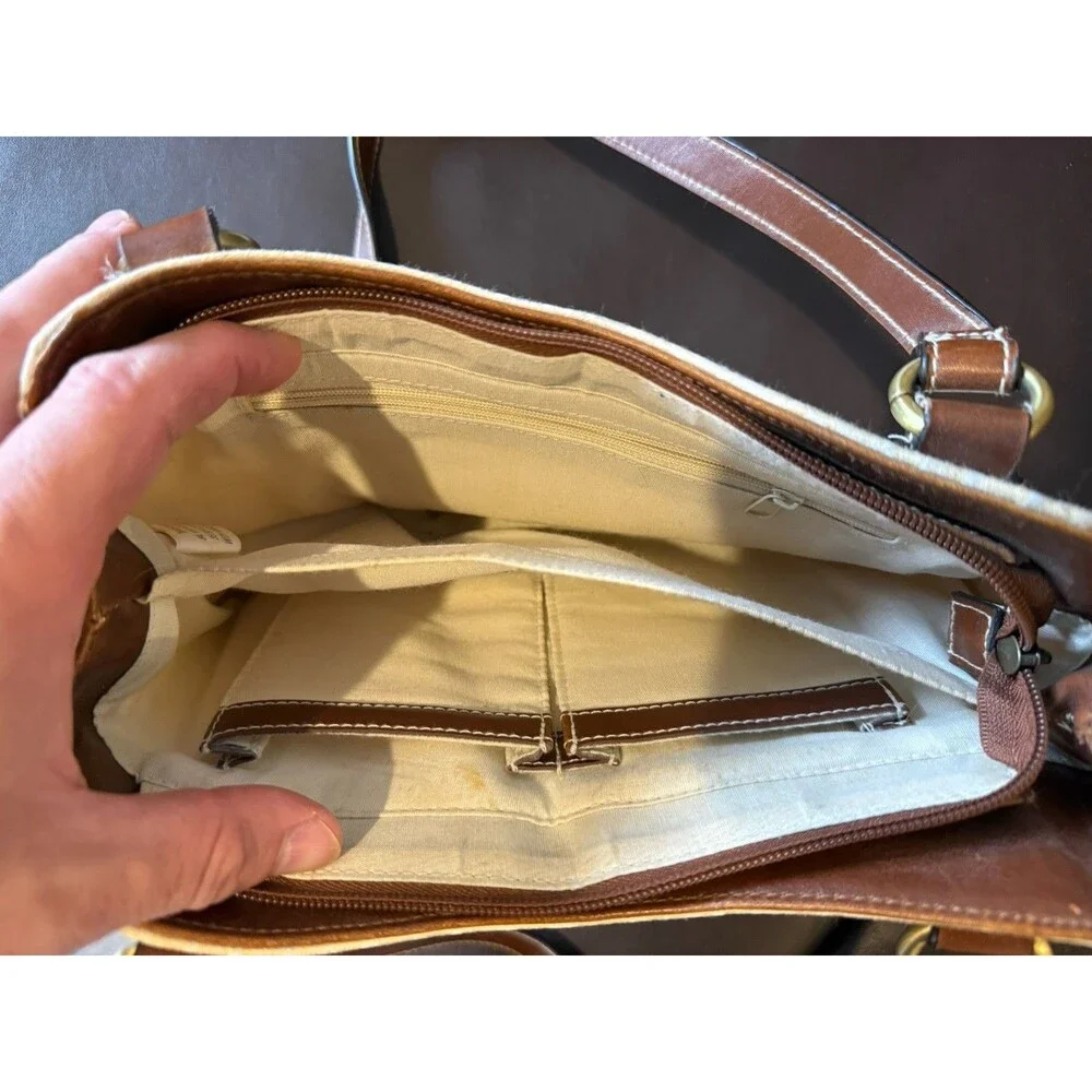 Rosetti shoulder bag with matching wallet in a white and brown color scheme.